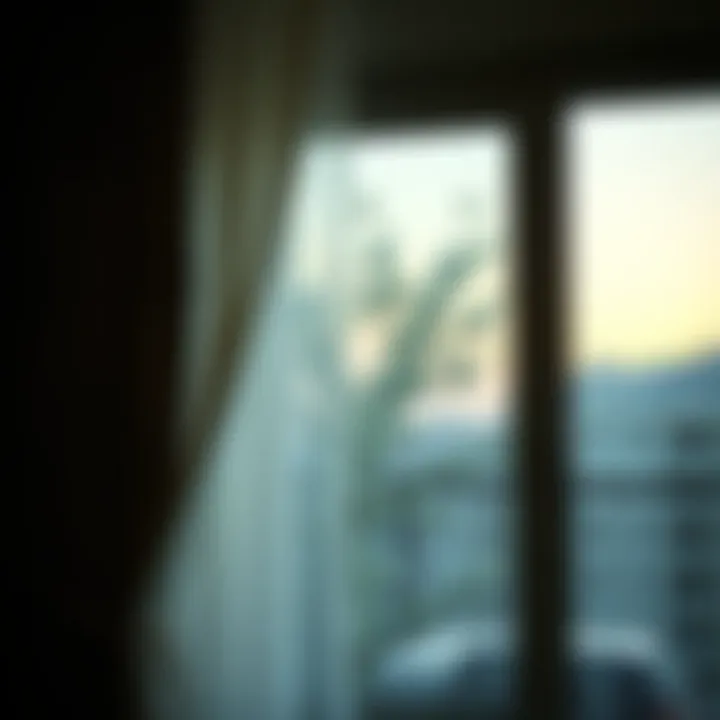 A decorative curtain adhering to a window