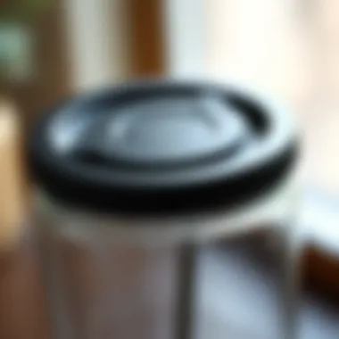 Close-up of innovative lid mechanism on glass container