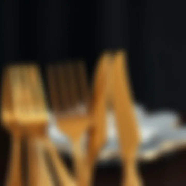 Intricate Design of Gold Cutlery Close-up view of the intricate design of gold forks and knives