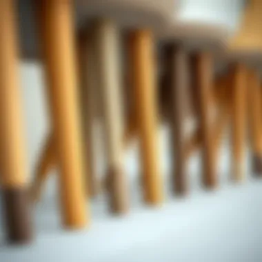 Various wood types and finishes for chair legs arranged aesthetically