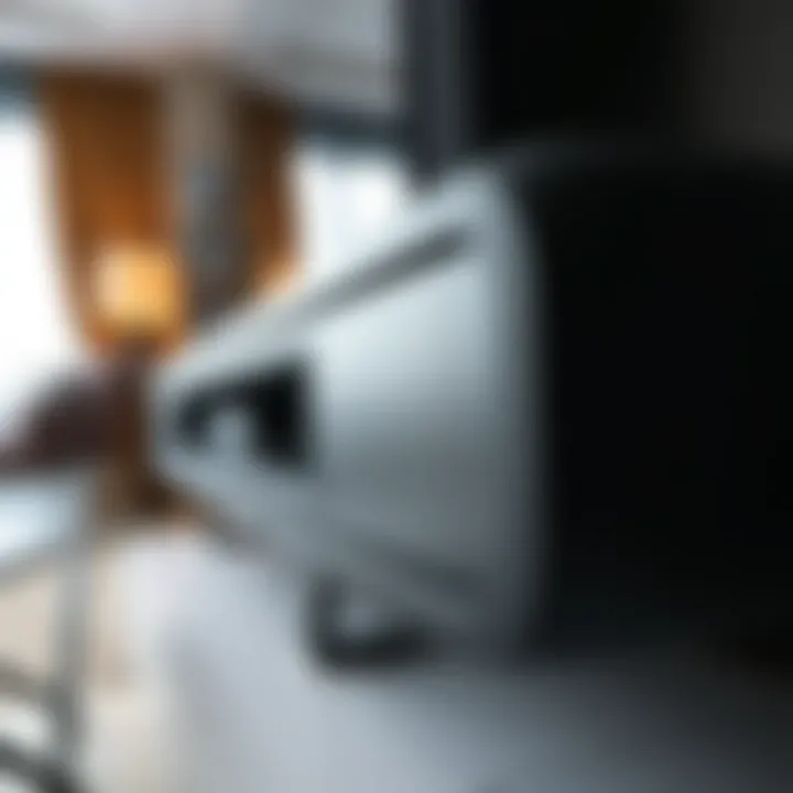 Close-up of the sleek design features of a black metal TV unit